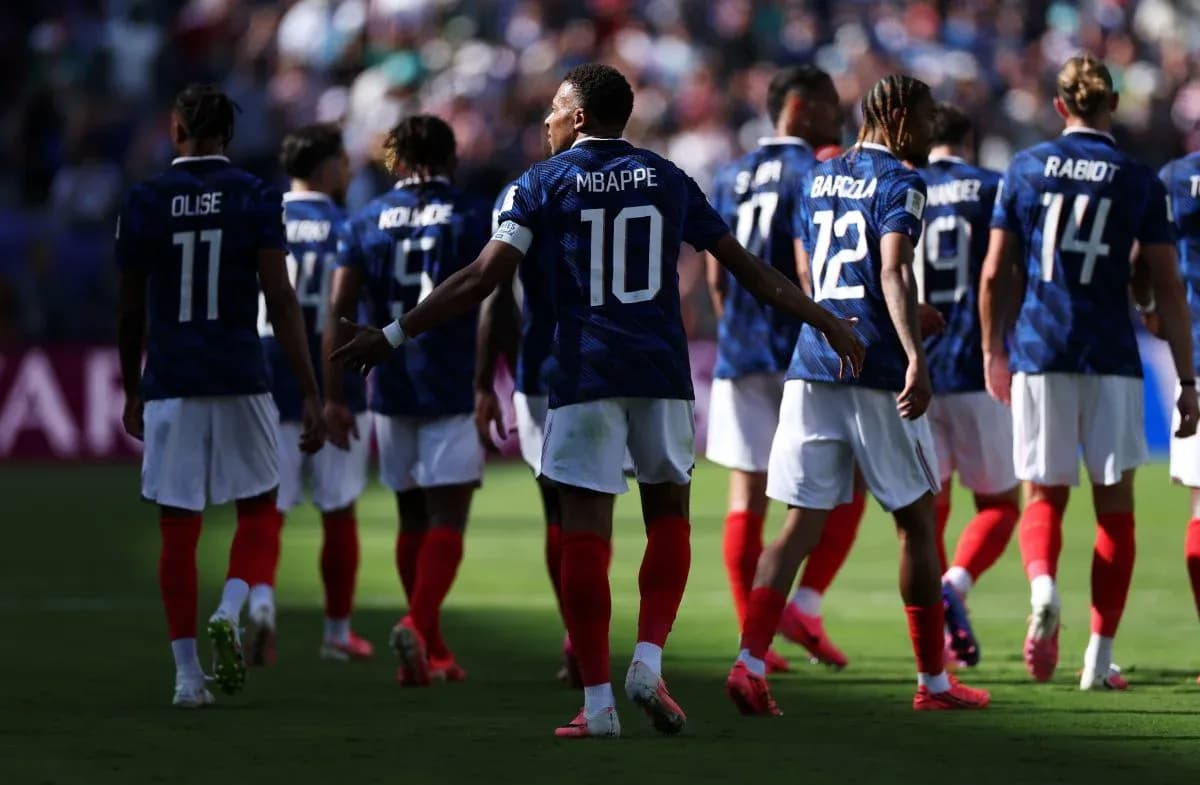 French national team players walking on the field