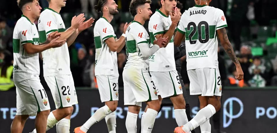 Elche players celebrating during La Liga match