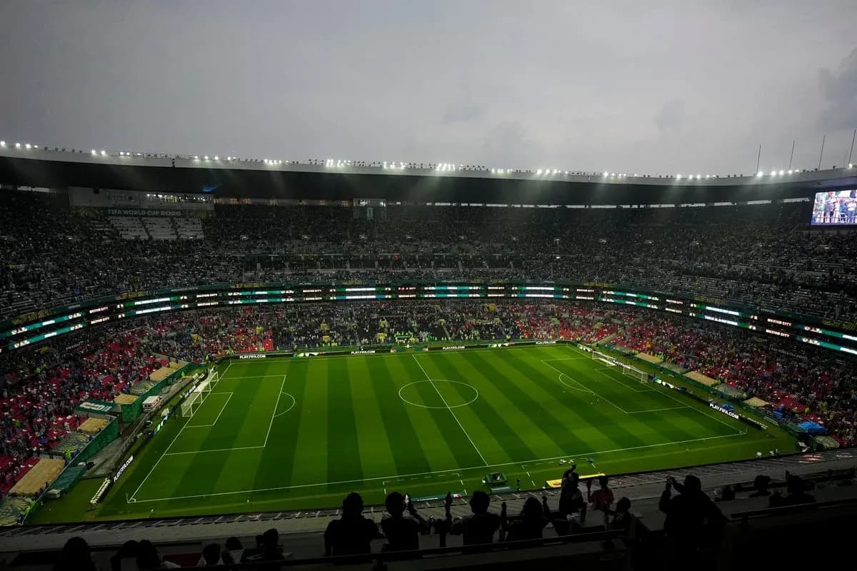 Empty stadium before a match with fans arriving