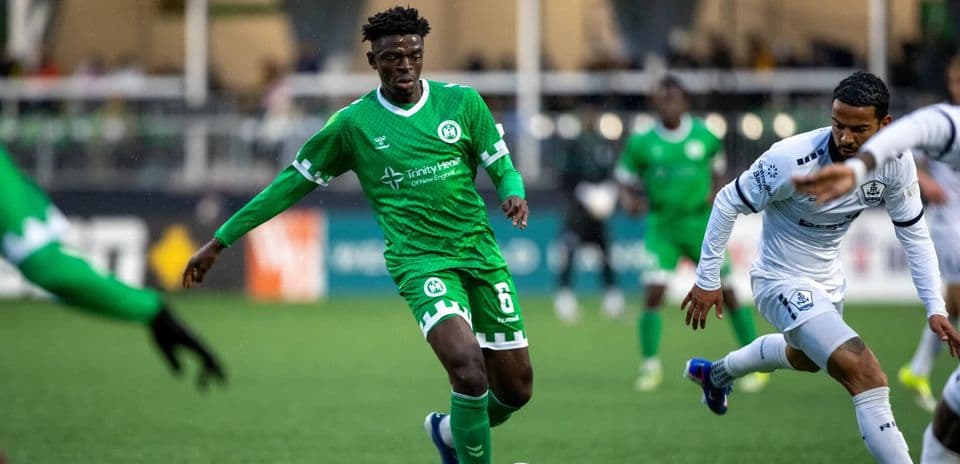 Player dribbling the ball during USL match