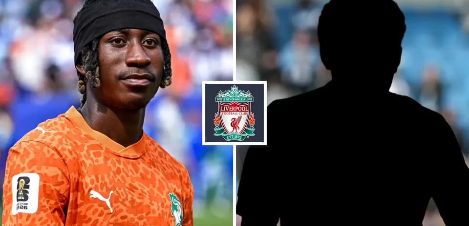 Goalkeeper in orange jersey with Liverpool logo