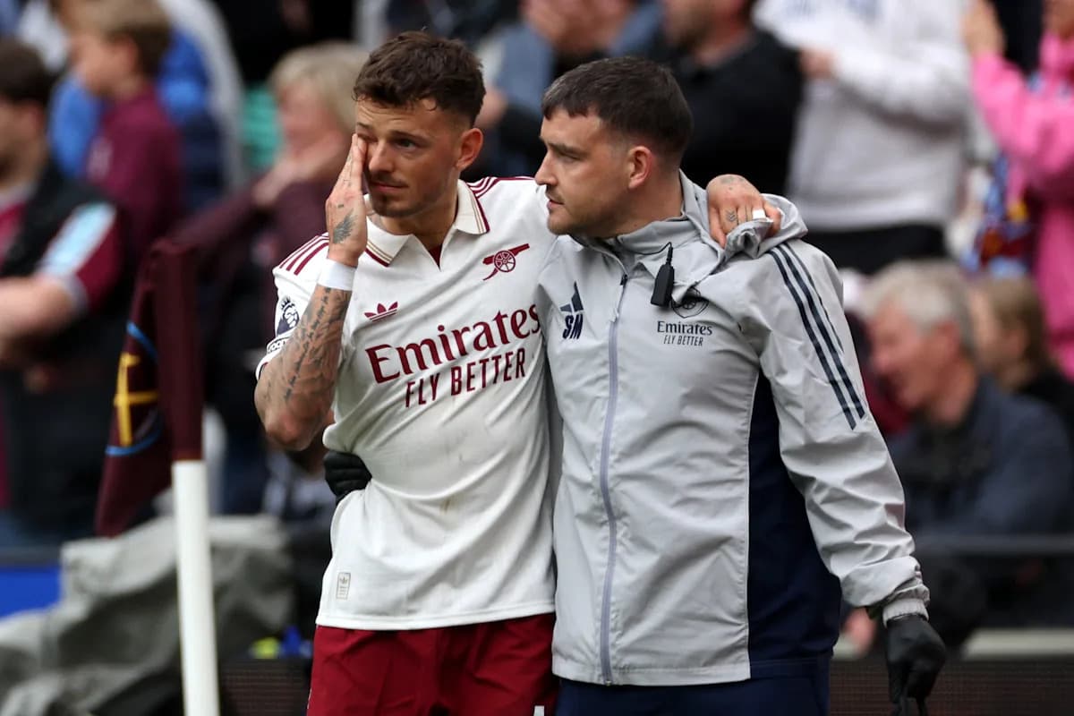 Player receiving support from staff after leaving pitch