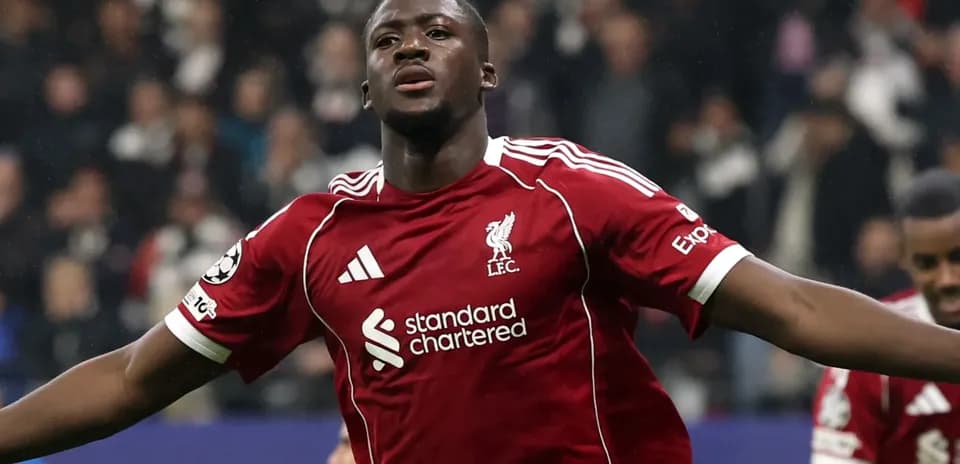 Player celebrating goal in Liverpool red jersey