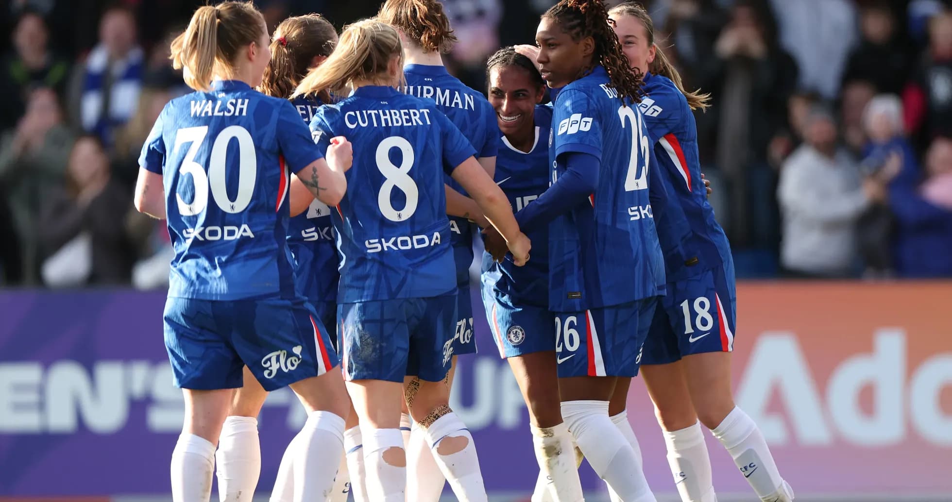 Chelsea W players celebrating a goal