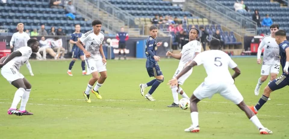 Players competing during Toronto II vs Huntsville City match