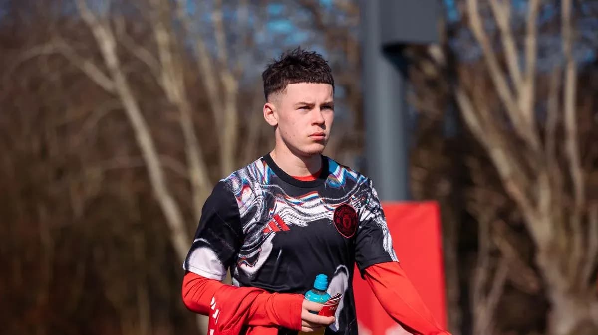 Player walking during training session with water bottle
