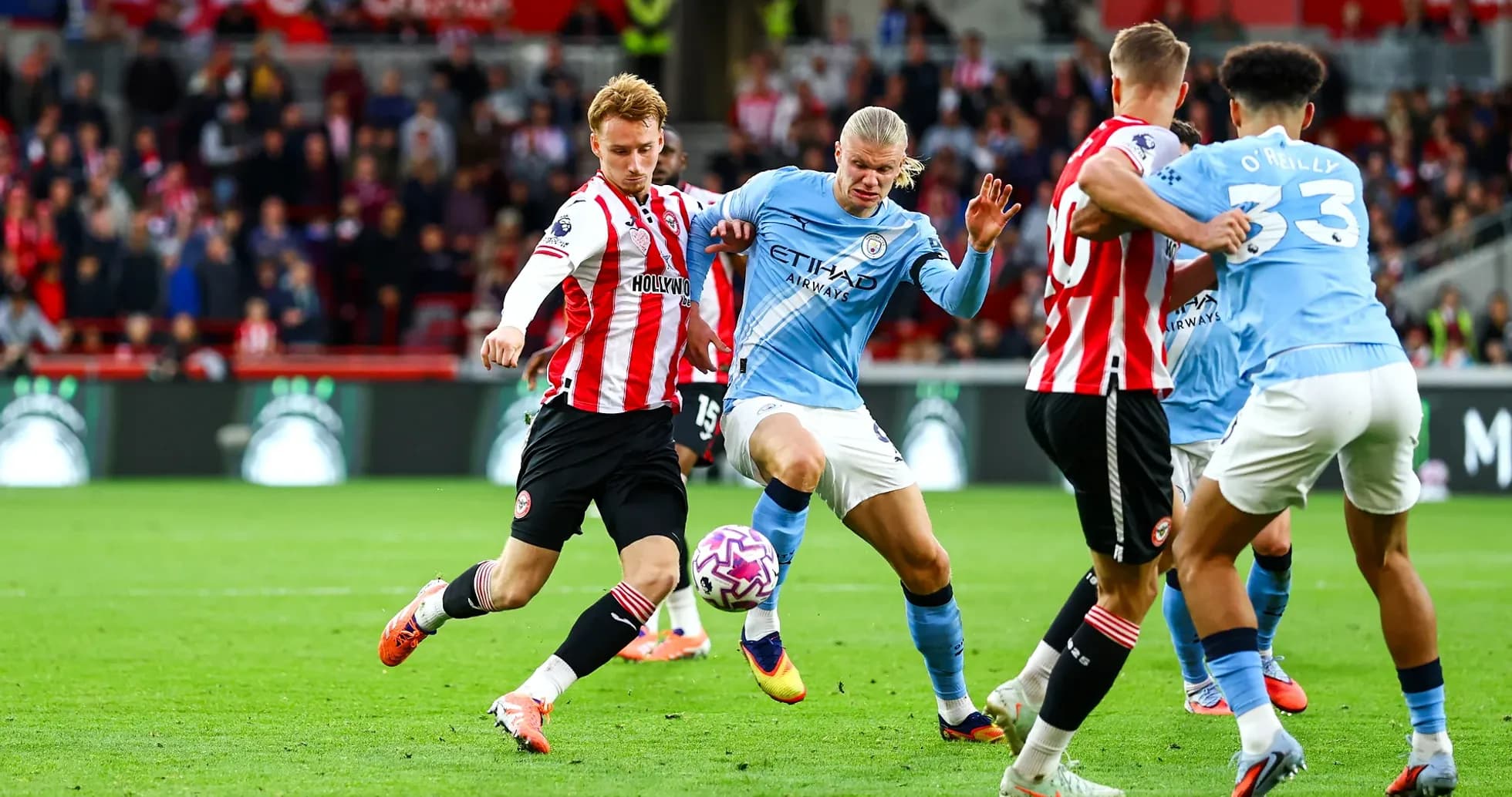 Manchester City player challenged by Brentford defender