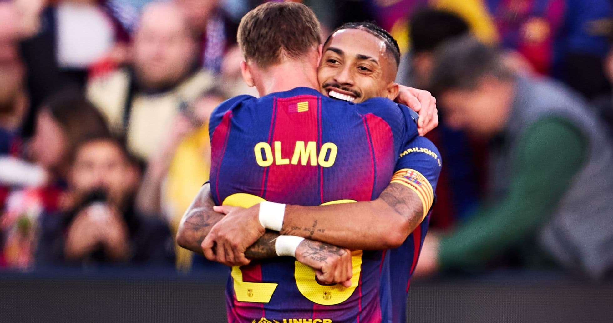 Players celebrating a goal for Barcelona
