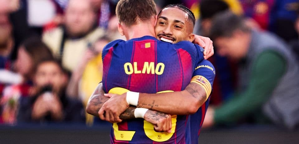 Players celebrating a goal for Barcelona