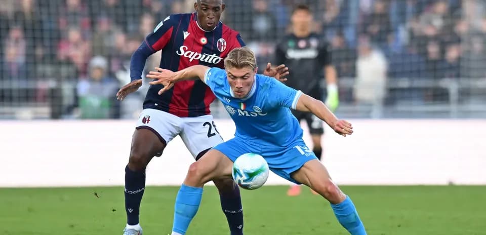Players battling for the ball in Serie A match