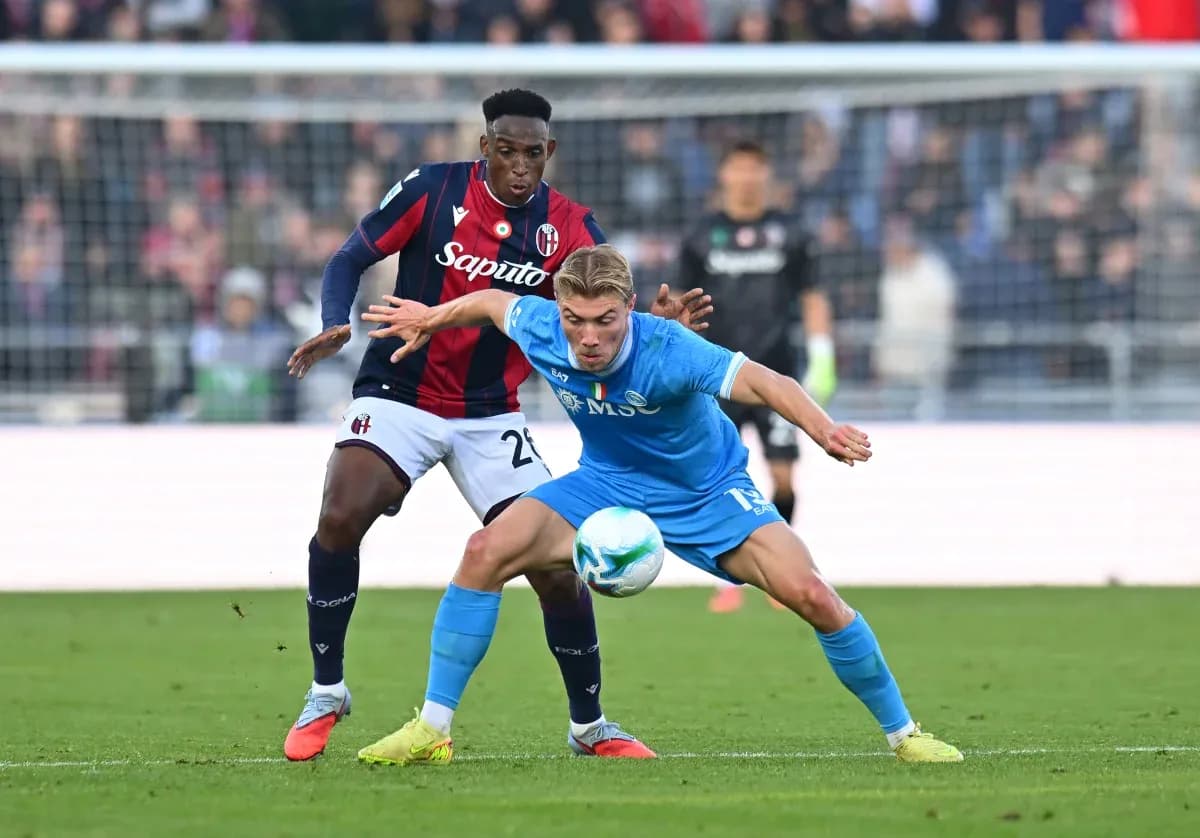 Players battling for the ball in Serie A match