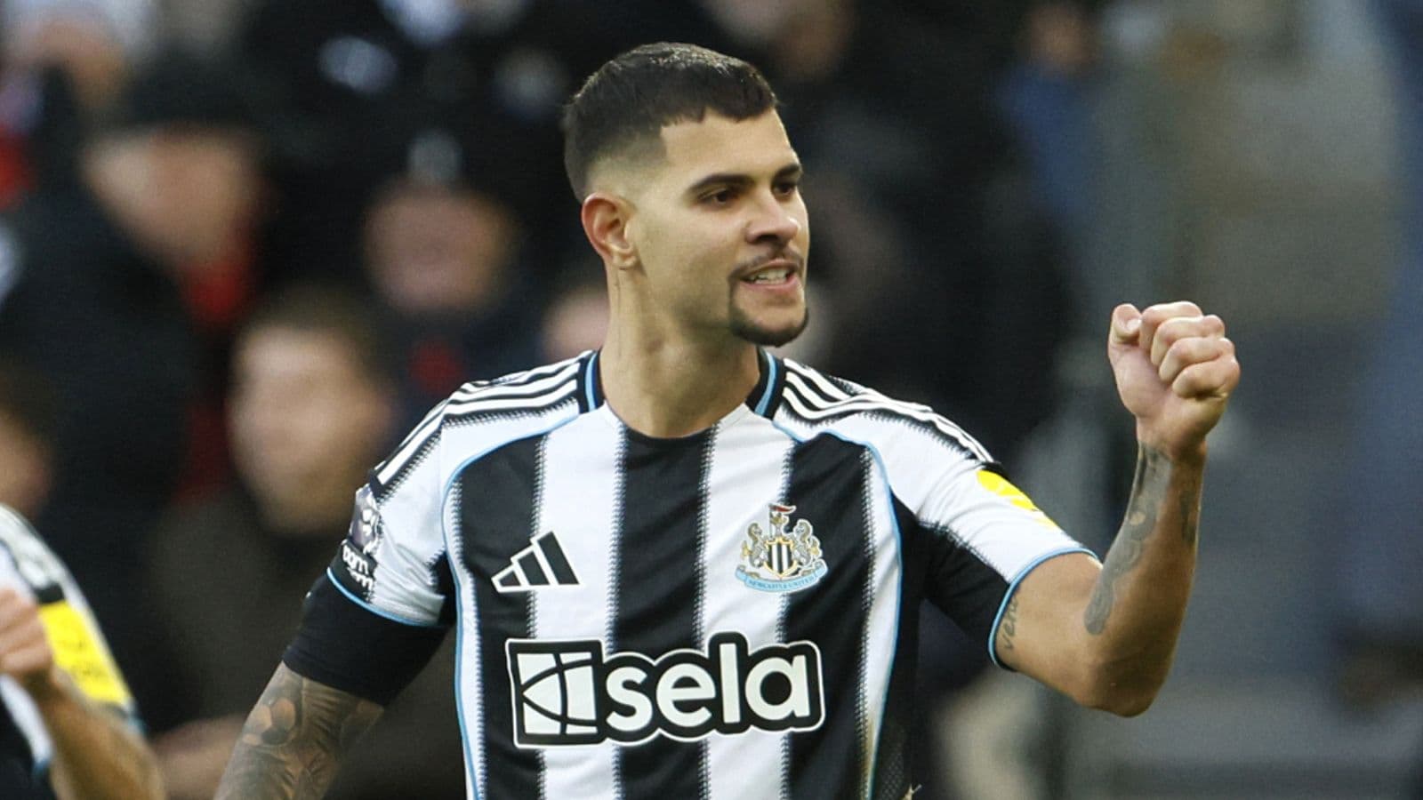 Newcastle player celebrating during match