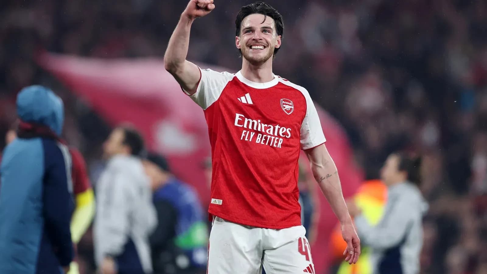 Player celebrating victory on the pitch