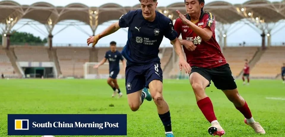 Player chasing the ball during a soccer match