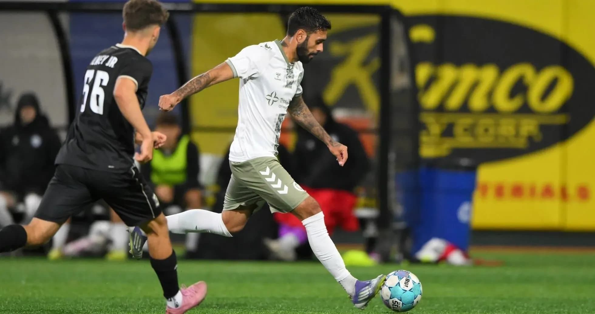 Player dribbling the ball during Cosmos match