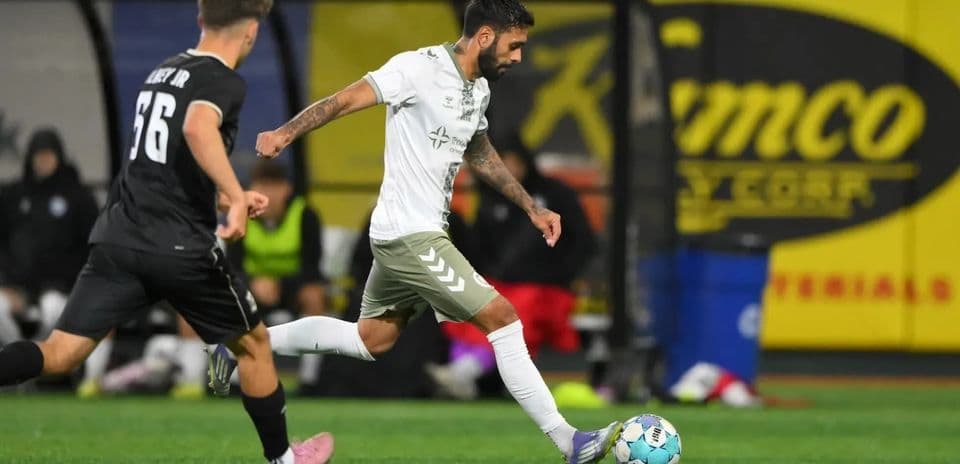 Player dribbling the ball during Cosmos match