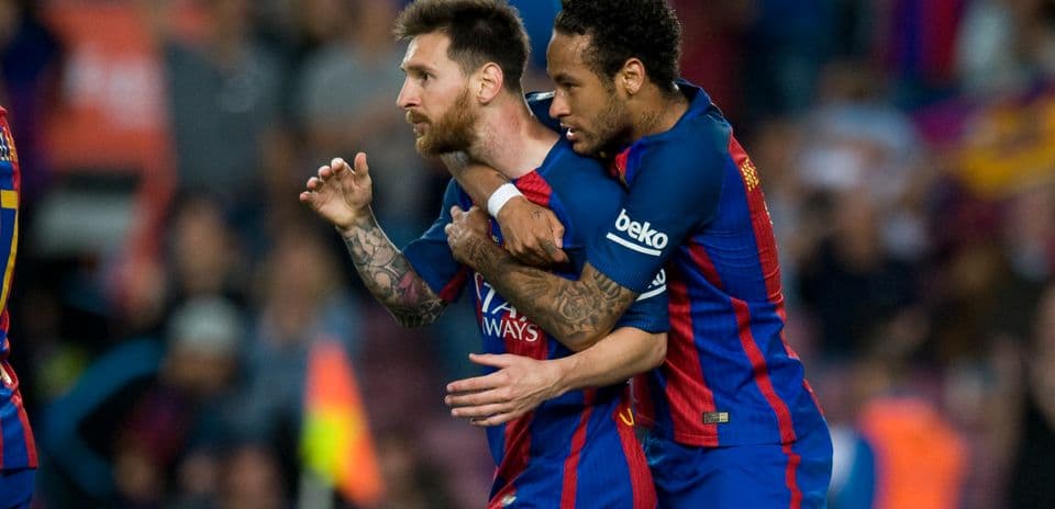 Lionel Messi and Neymar celebrating a goal together