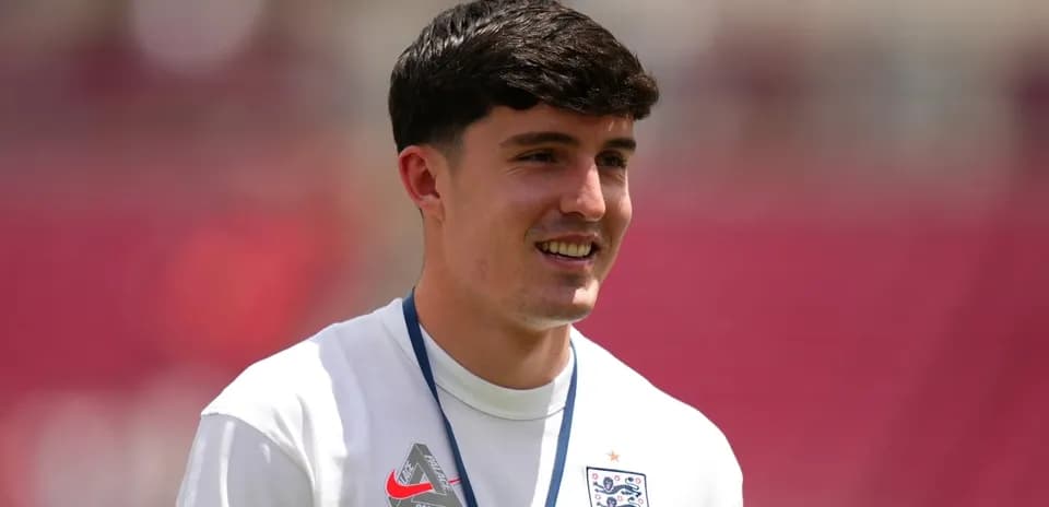 Player smiling during warm-up on field