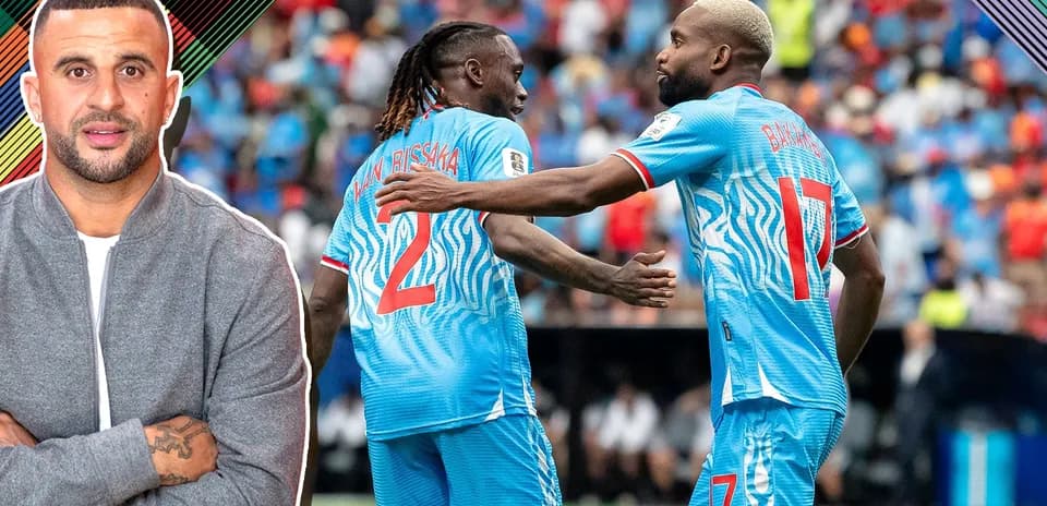 Two players celebrating a goal during a match