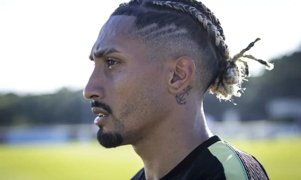 Player with braided hairstyle during training session