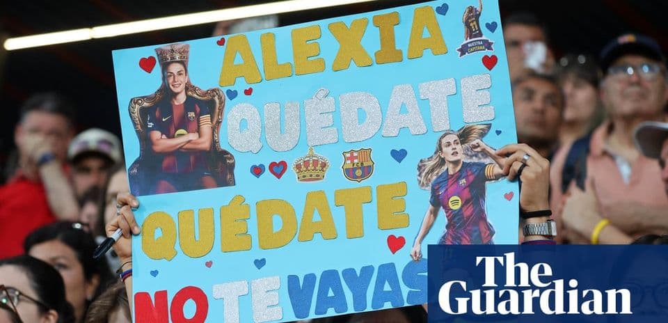 Fan holding sign for Alexia at football match