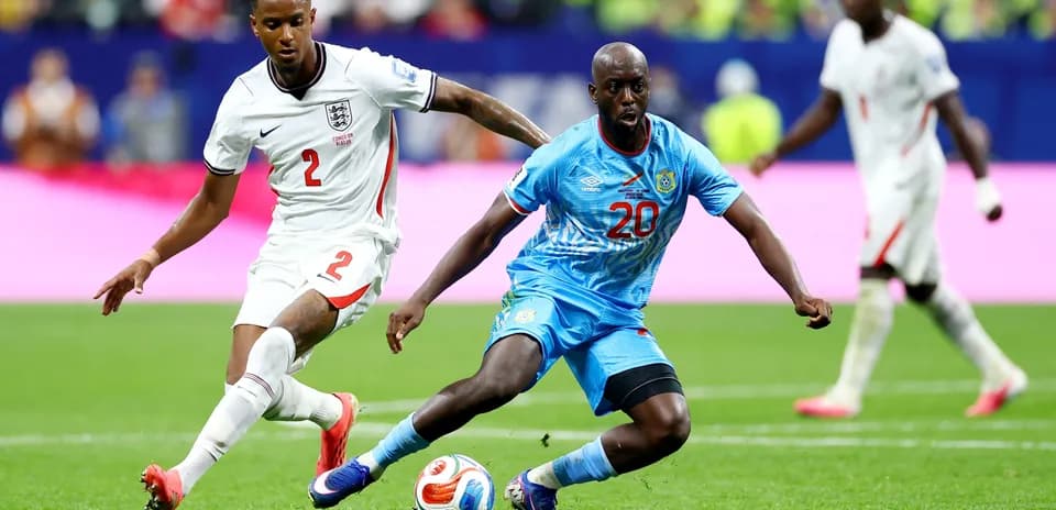England and Congo DR players competing for the ball