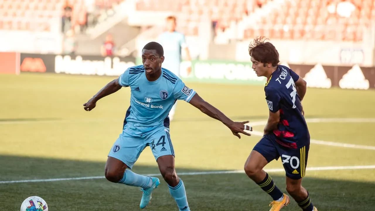 Players competing for the ball in MLS Next Pro