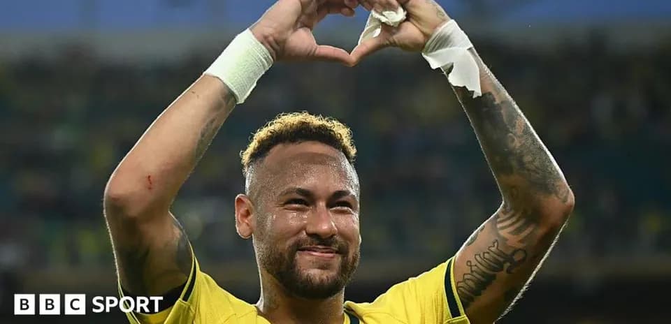 Neymar celebrating with heart gesture after match