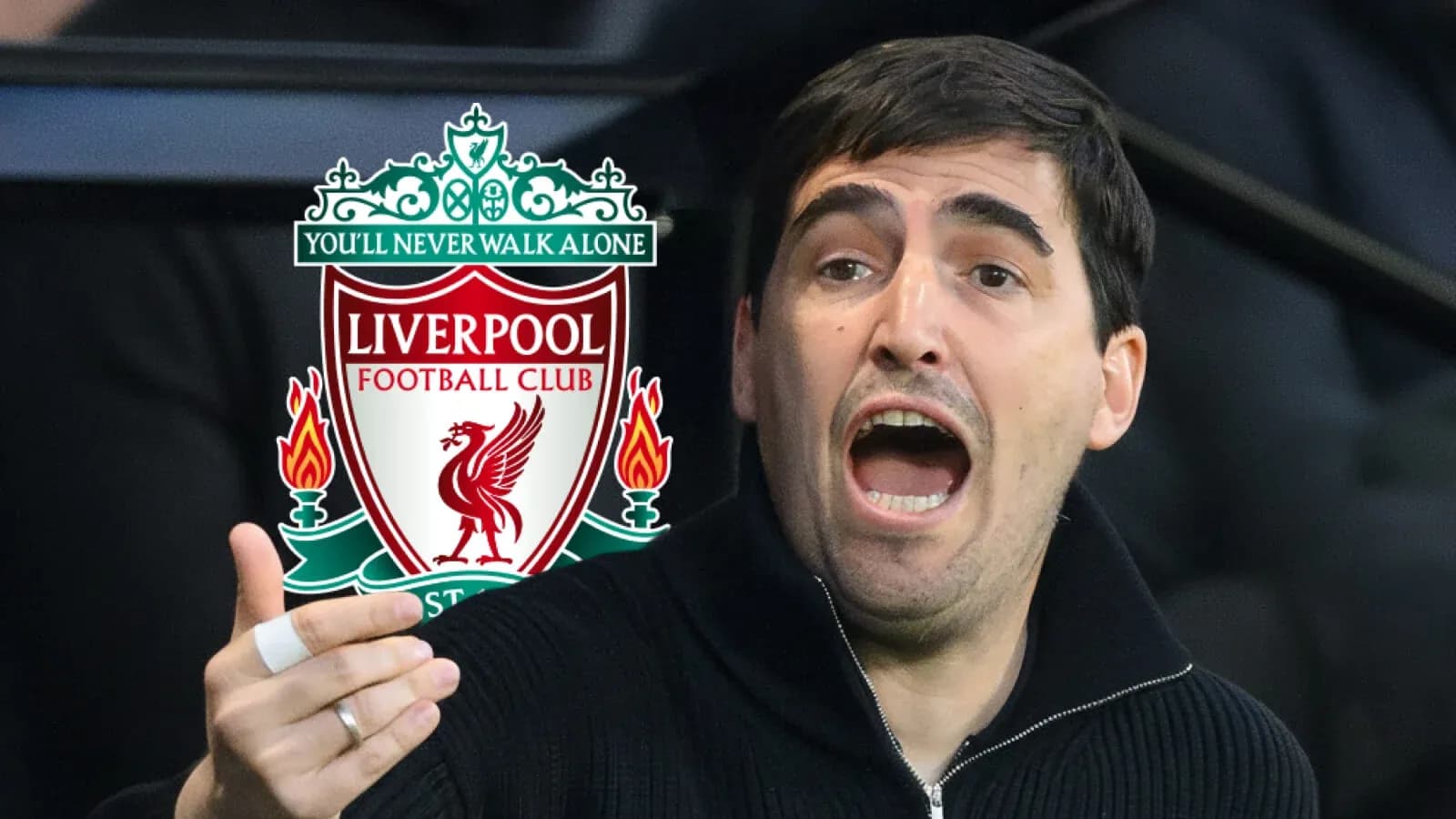 Person passionately gesturing near Liverpool FC logo