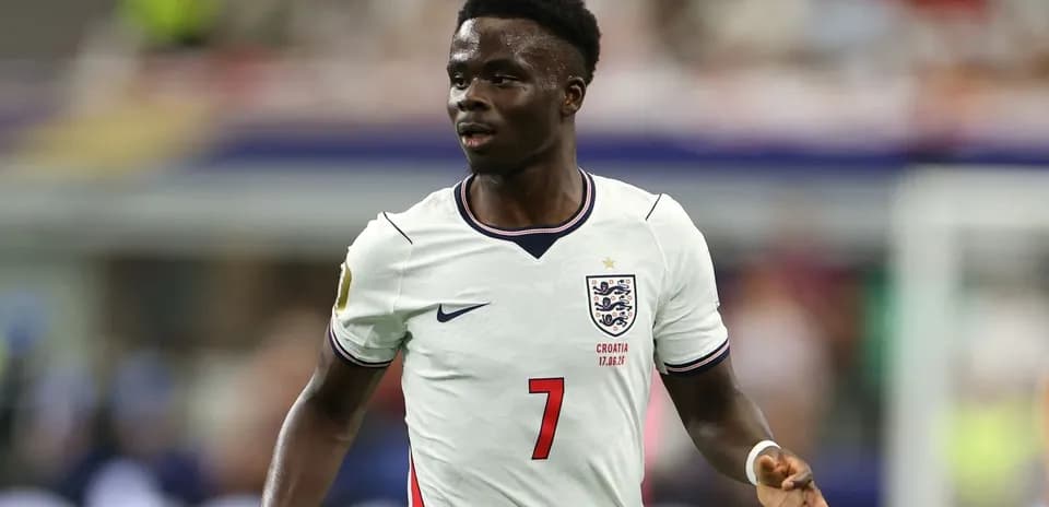 Player wearing England kit during match action