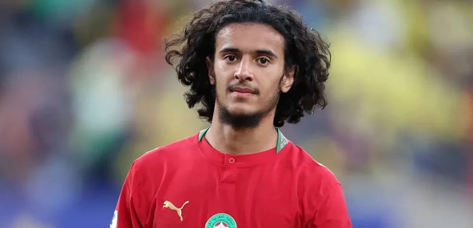 Moroccan player in red jersey during match