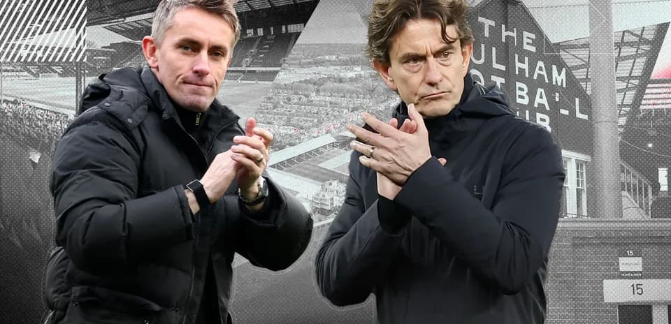 Two football managers applauding at stadium entrance