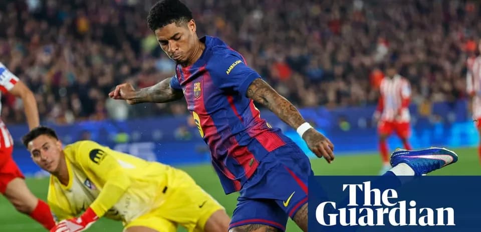 Barcelona player shooting at goal against goalkeeper