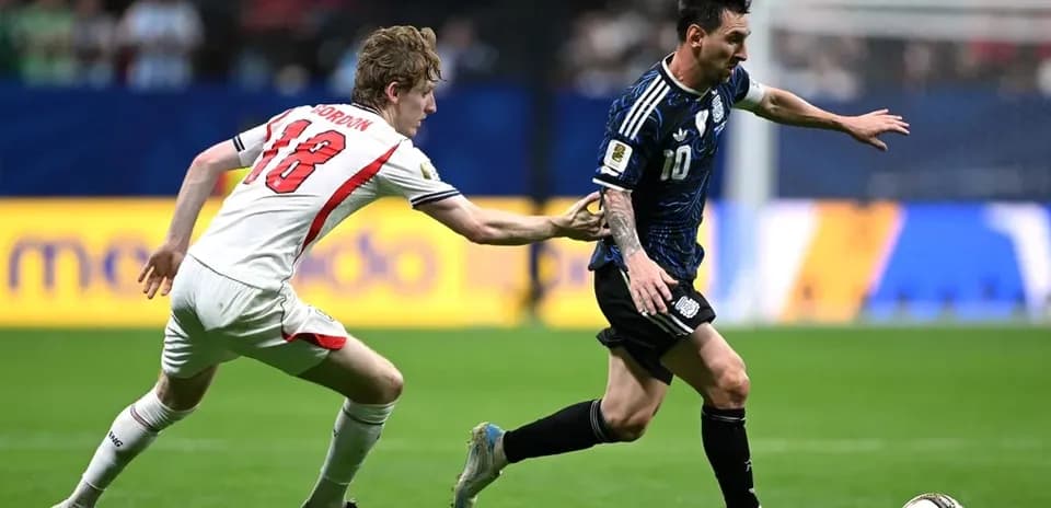 Player evading opponent while dribbling the ball
