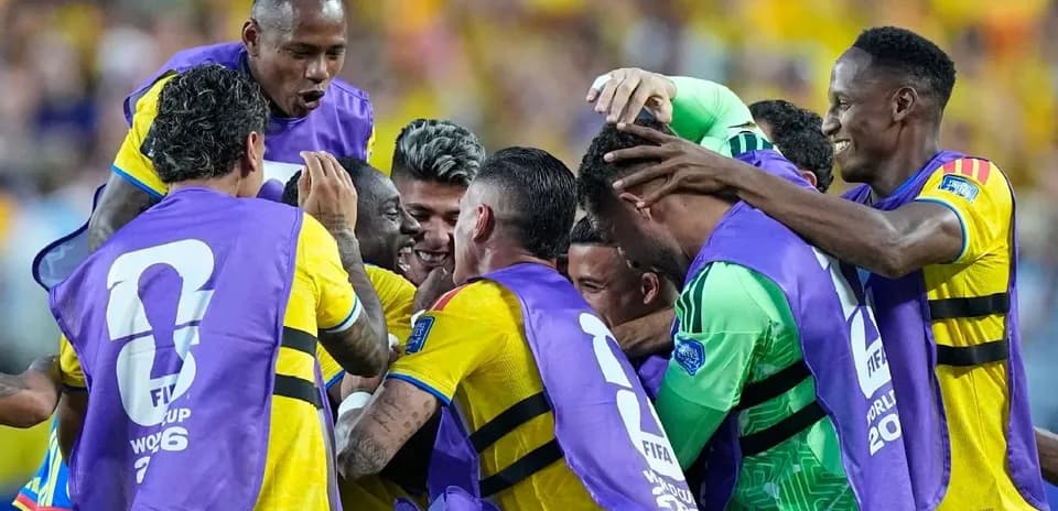 Players celebrating together after a goal scored