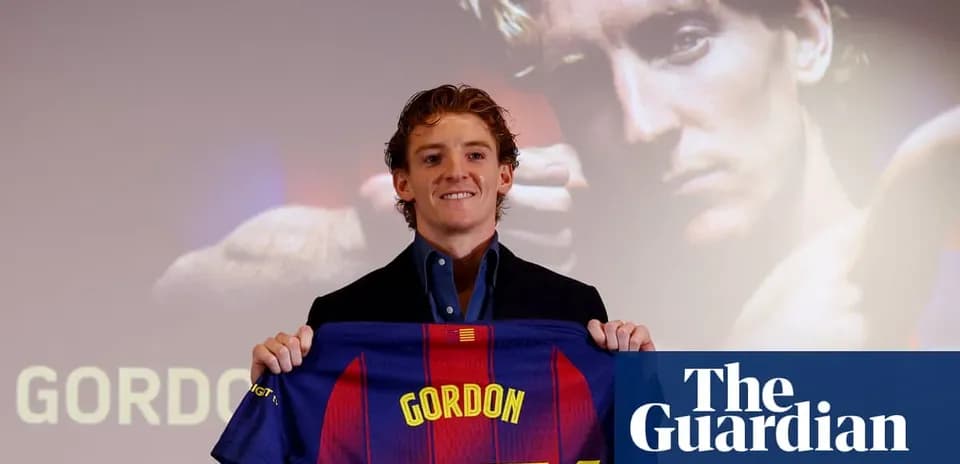 Player holding FC Barcelona jersey at presentation