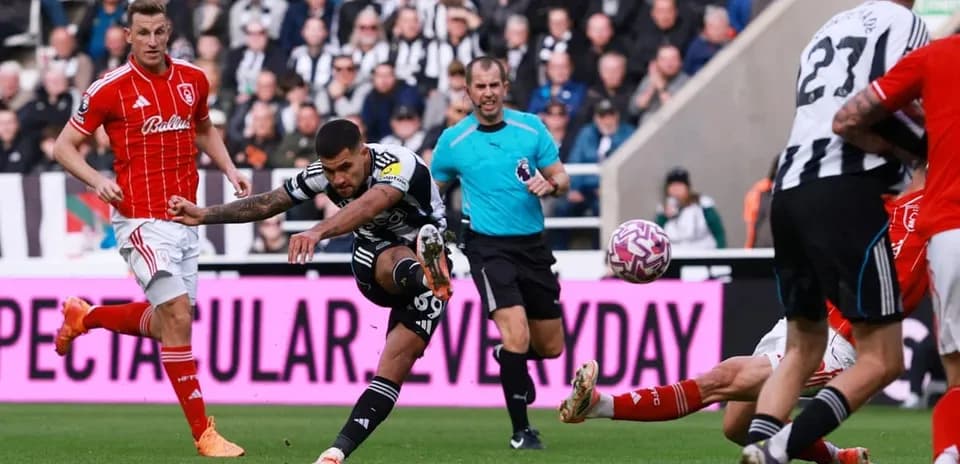 Player shooting during Nottingham Forest vs Newcastle match