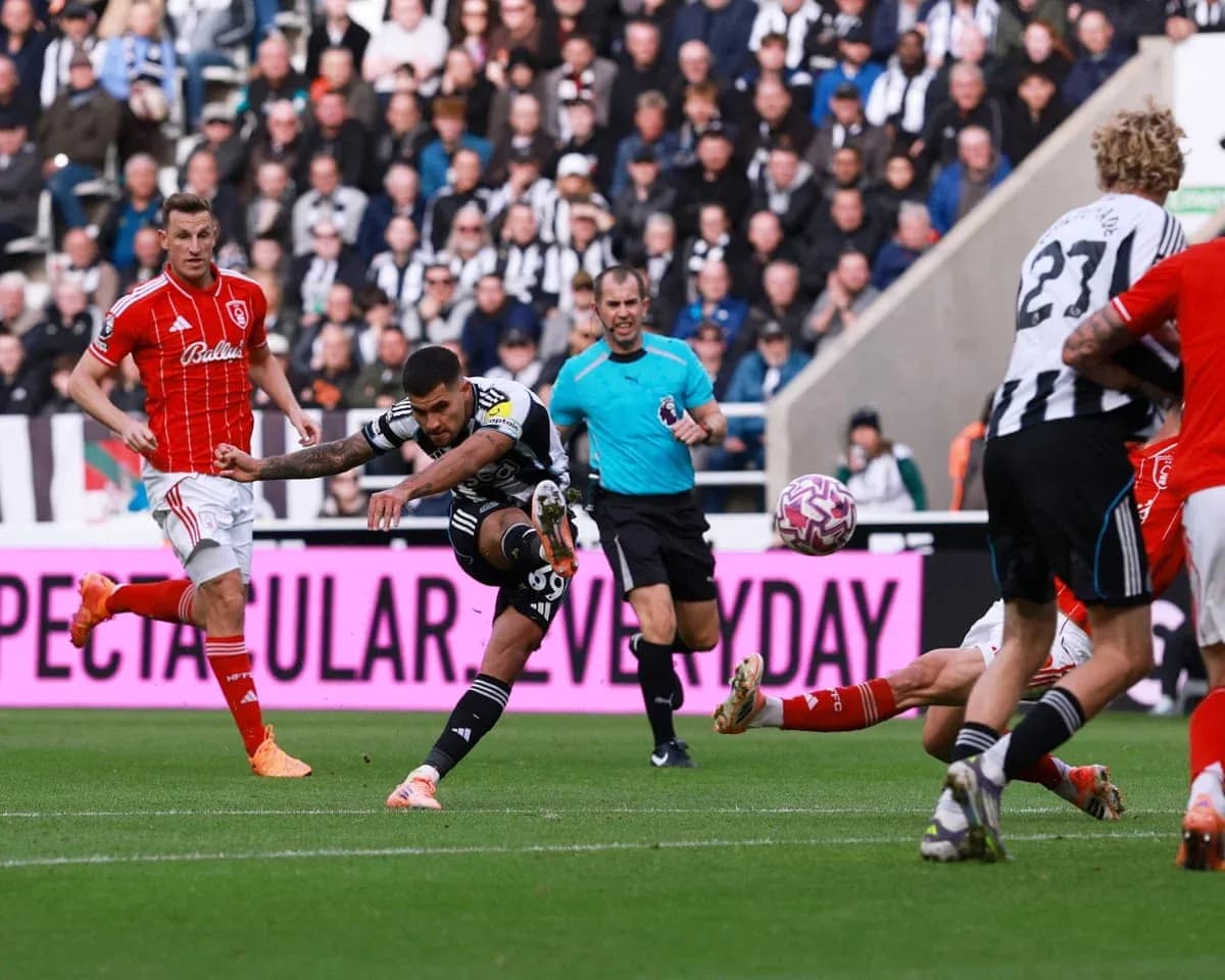 Player shooting during Nottingham Forest vs Newcastle match