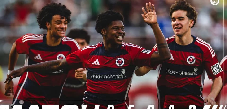 Players celebrating during The Town vs North Texas match