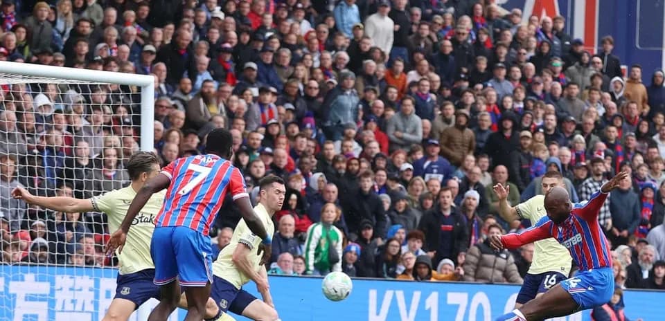 Crystal Palace player shooting during match against Everton