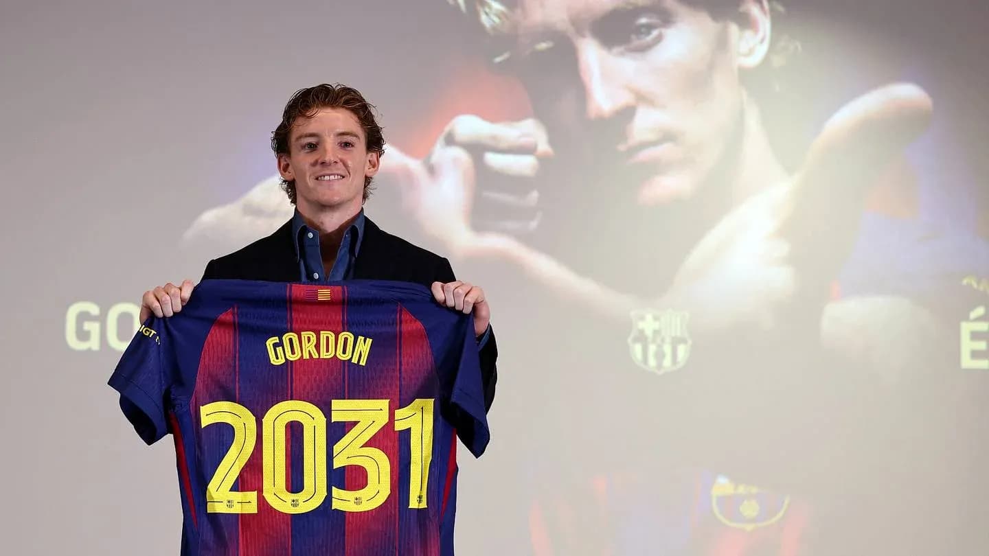 Player holding FC Barcelona jersey with number 2031