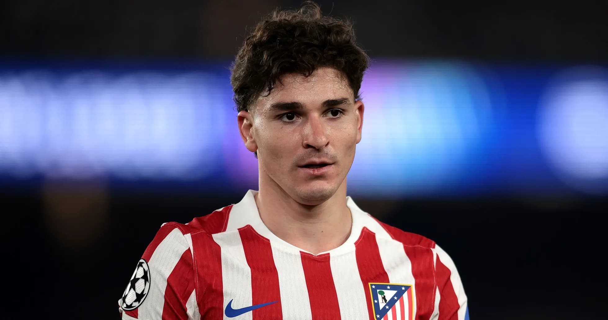 Player in Atlético Madrid jersey during match