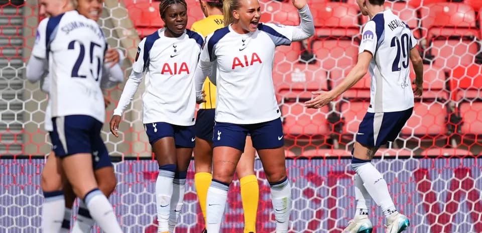 Tottenham players celebrating during FA WSL match