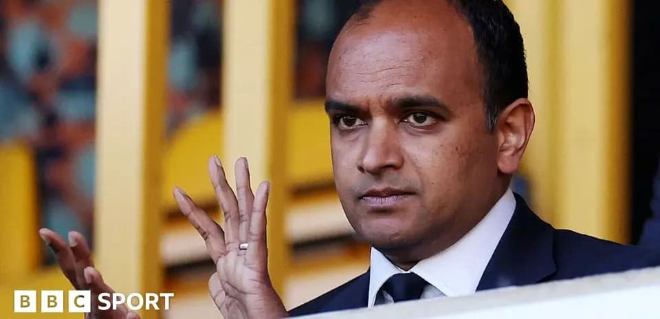 Man gesturing during a sports event in stadium