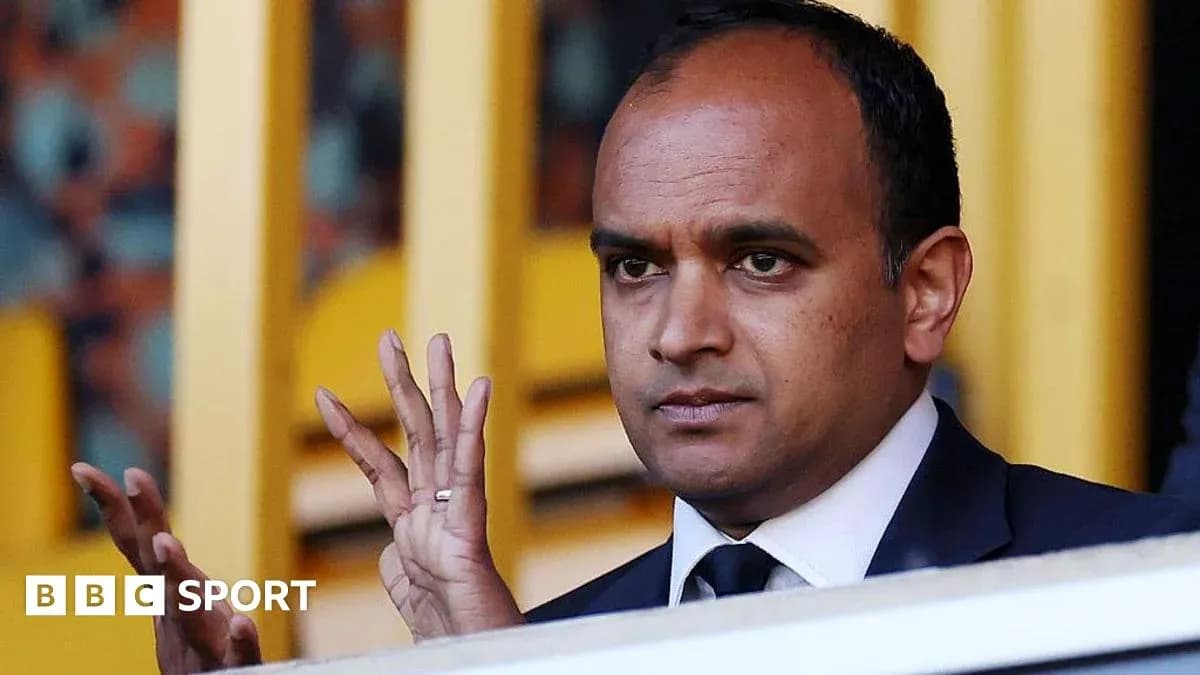 Man gesturing during a sports event in stadium