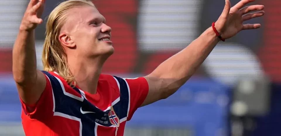 Player celebrating a goal on the field