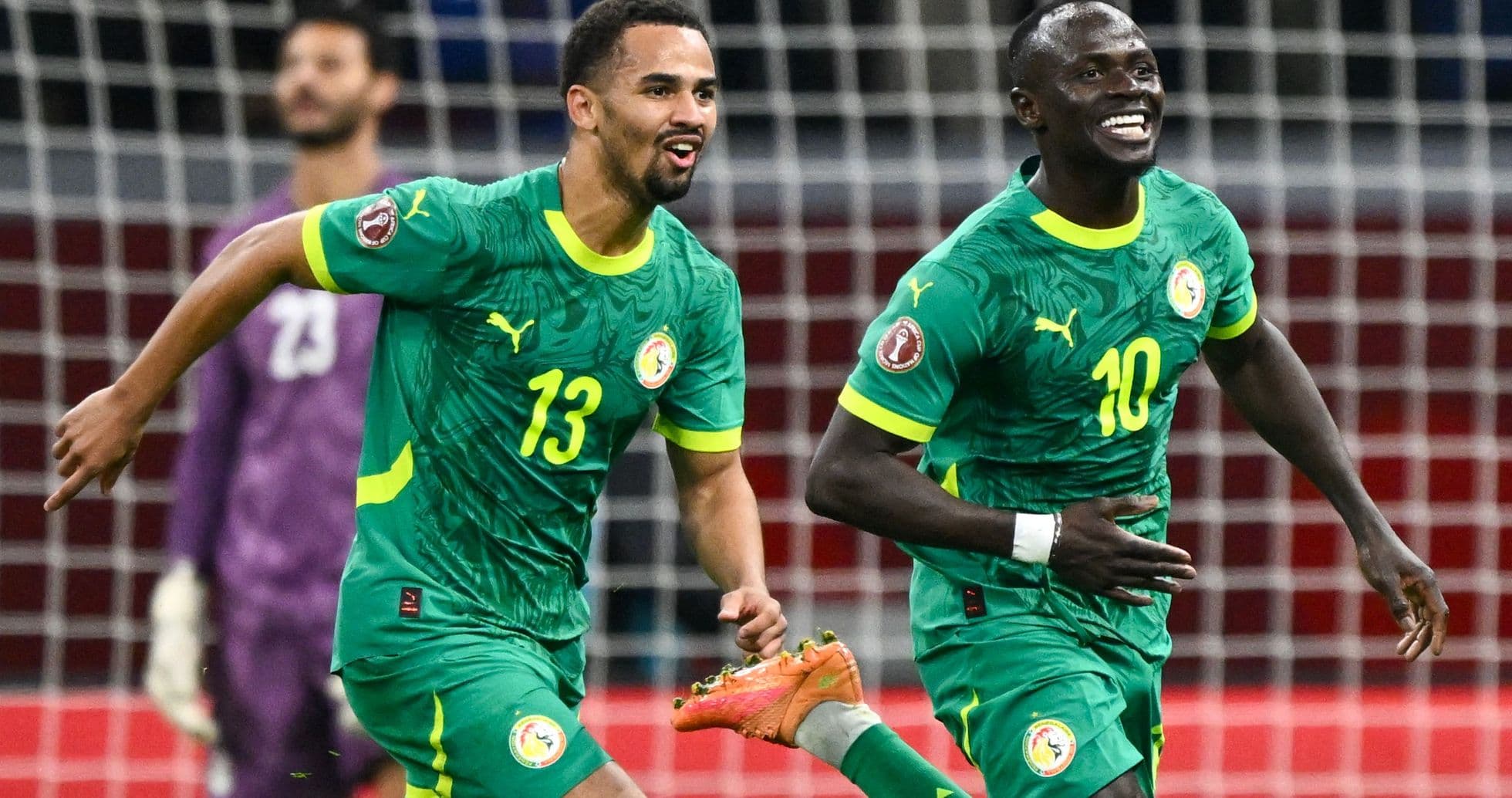 Senegal players celebrating a goal during a match