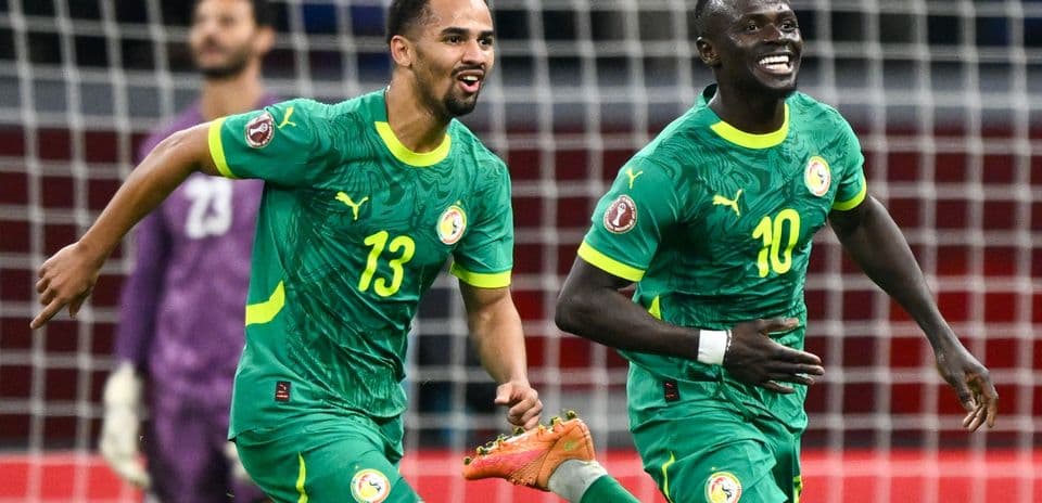 Senegal players celebrating a goal during a match
