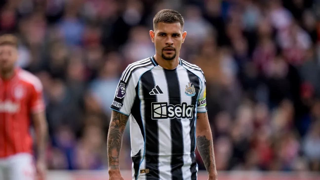 Newcastle player standing on the pitch during match