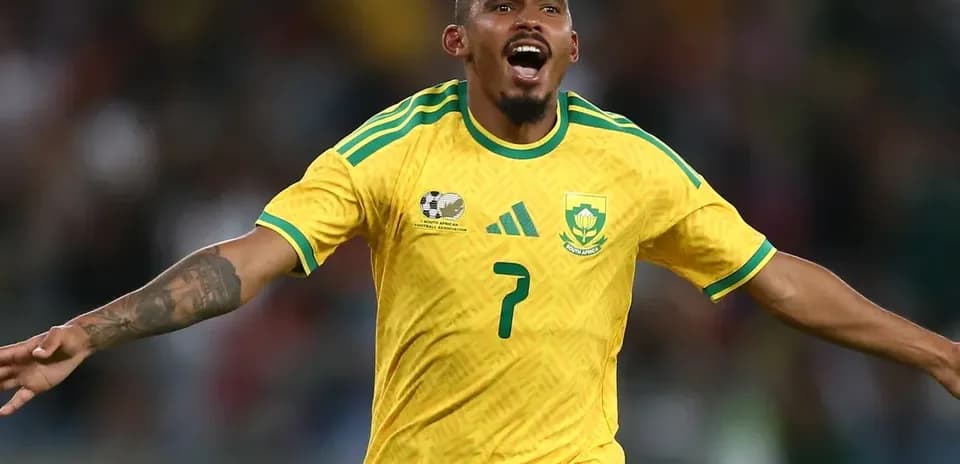 South African player celebrating a goal on field